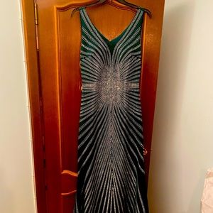 Brand new. Size 46 green dress. Gorgeous